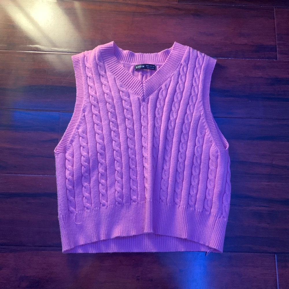 Pink vest.